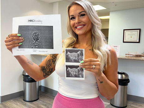 Surrogate Mother holding ultrasound